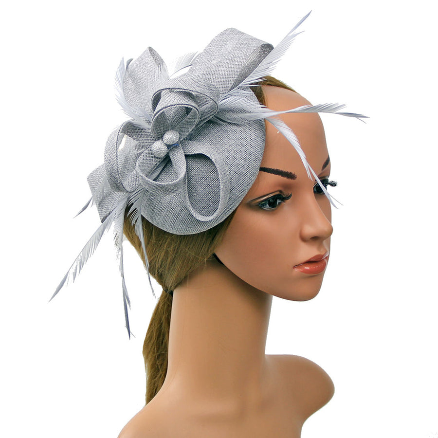 CHAPEAU DE SOIREE ORNÉ DE PLUMES